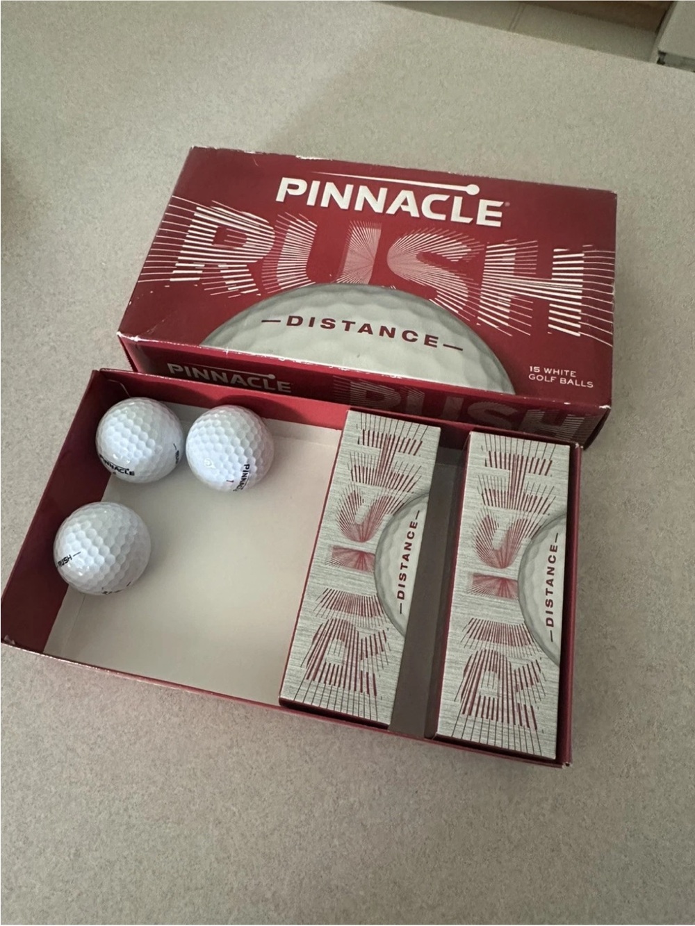 Lot of Golf Balls 9 Total pinnacle 2 boxes are new.